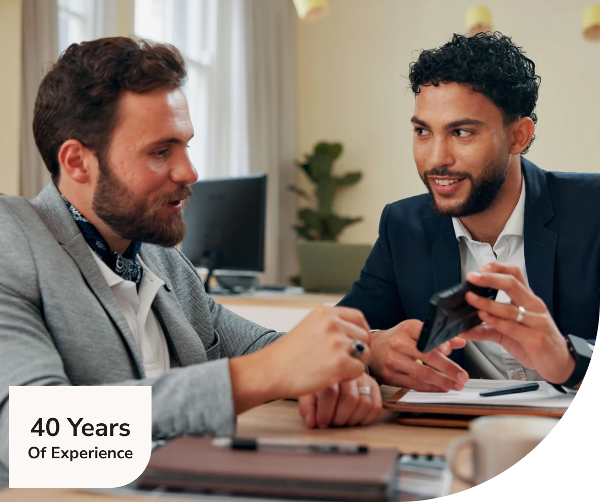 Two men discussing business plans