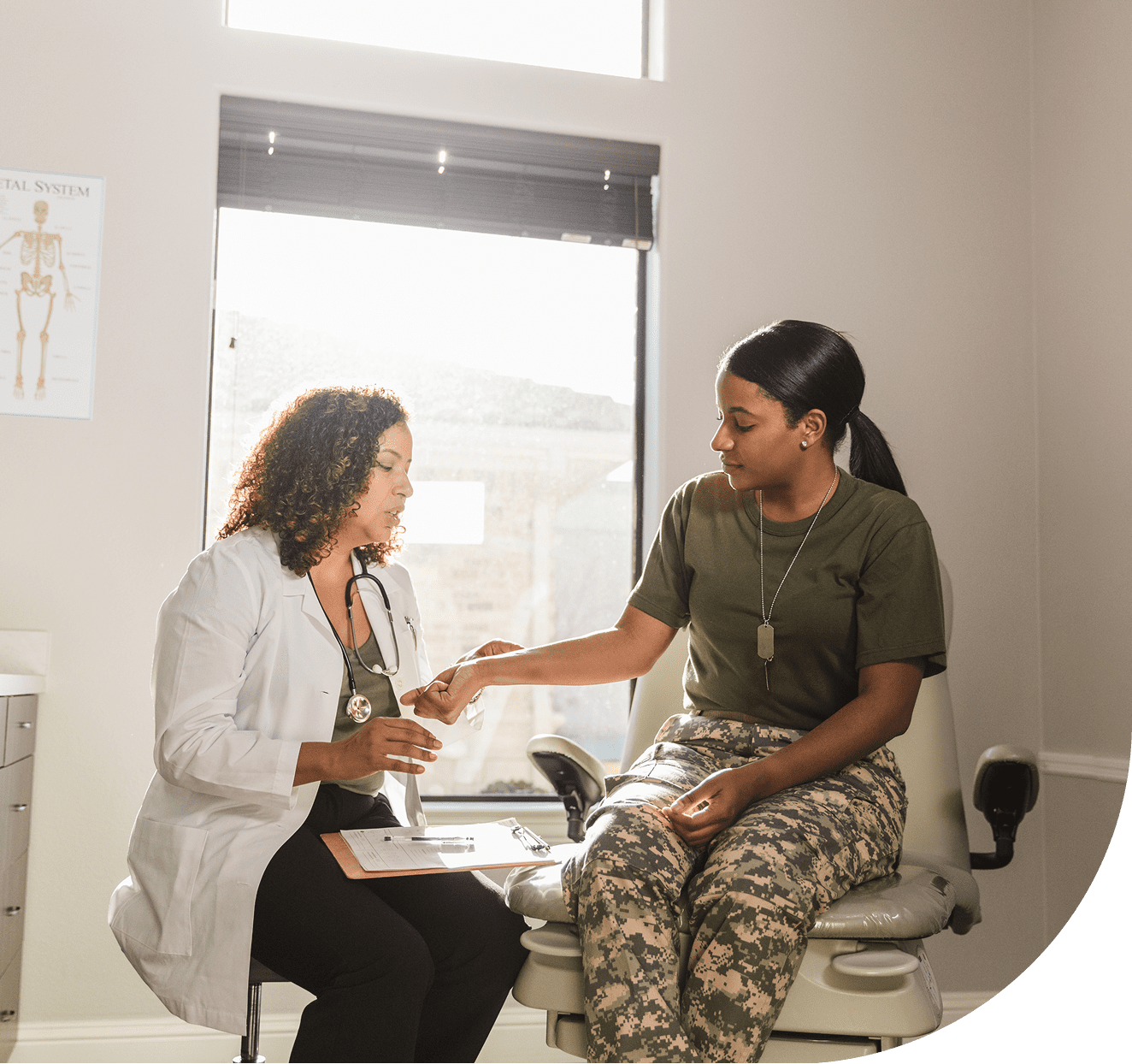 Doctor consulting with a patient in clinic.