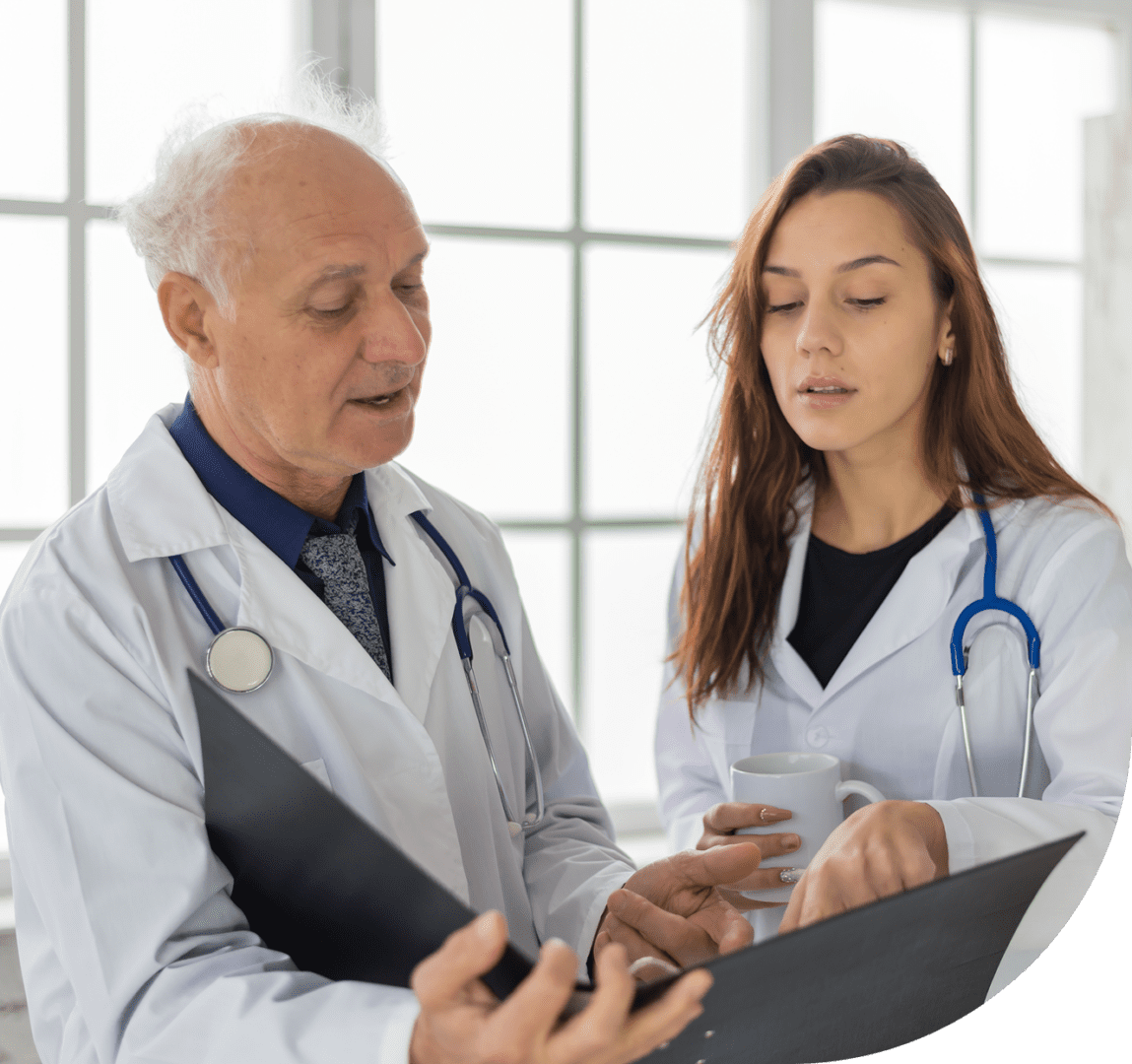 Doctors discussing patient charts
